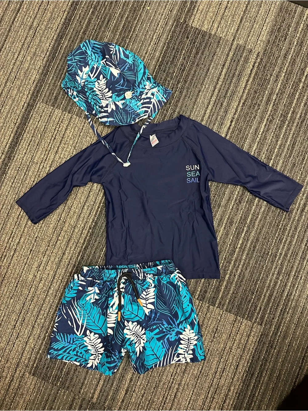 3 piece boys swim set includes swim trunks, shirt and bucket hat size 2T- 3T NEW